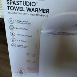 New Sharper Image towel warmer. Great gift.