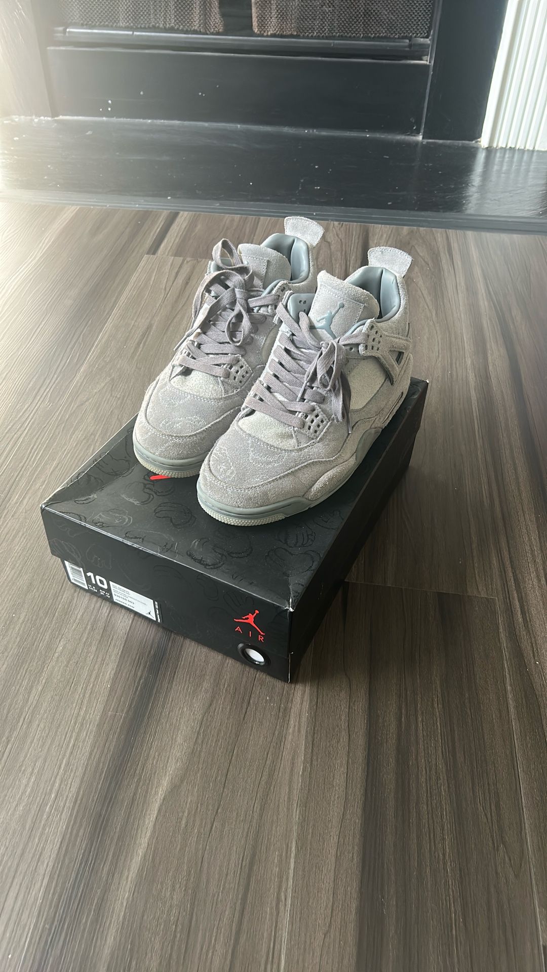  KAWS x Air Jordan 4 Retro 'Cool Grey'