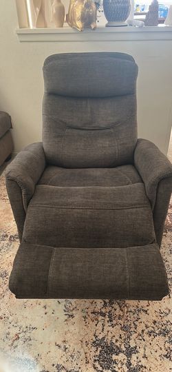 Charcoal gray swivel rocker recliner
