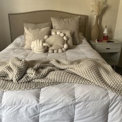 Queen bed with nice mattress and nightstand