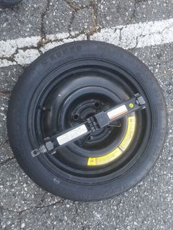 Four holes spare tire / 125/70/15