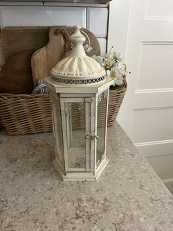 Pending Metal and glass lantern $10