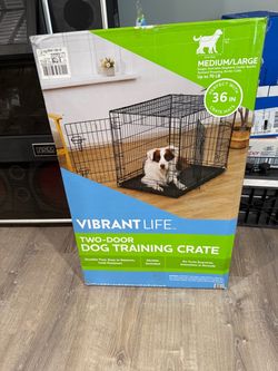 Doggie cage. Has a divider NEW