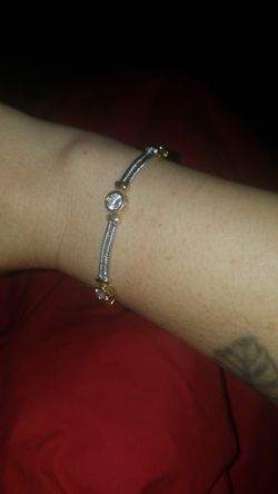 Sterling silver bracelet with gold plating.