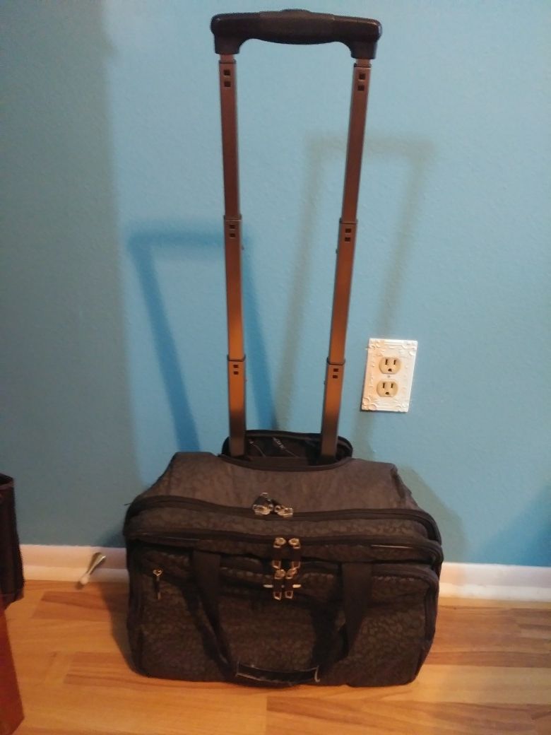 Laptop carry all on wheels