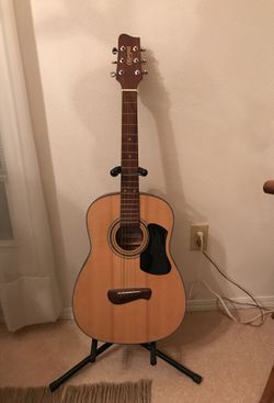 Olympia 1/2 guitar with stand