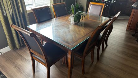 Dining table with 6 chairs and glass top