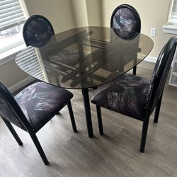 Dinning Table-  Glass Top- 4 Chairs- Great Shape 