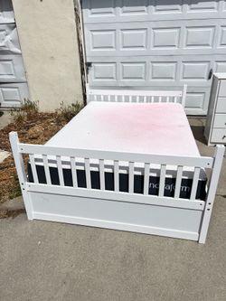 White full size bed frame with mattress