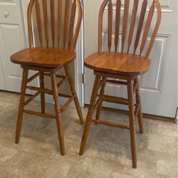 2 Oak Swivel Bar Stools 