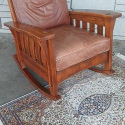 Quality Craftsman Solid Oak Mission Style Rocker Not Antique With Leater Cushions. Persian Rug Also Available