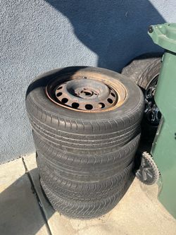 Used Tires on Steel Rims – Set of 4