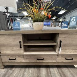67” TV Stand w/ sliding doors & drawers