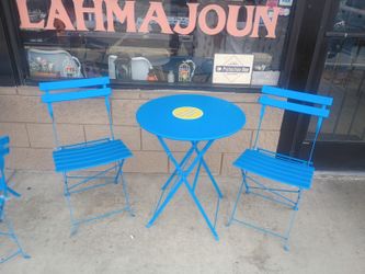 Three piece set tables and chairs
