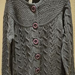 Women's Aran knit cardigan sweater  featuring traditional cable Stiching Size M