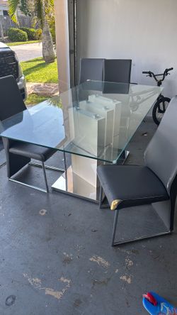 Free glass table with 6 chairs