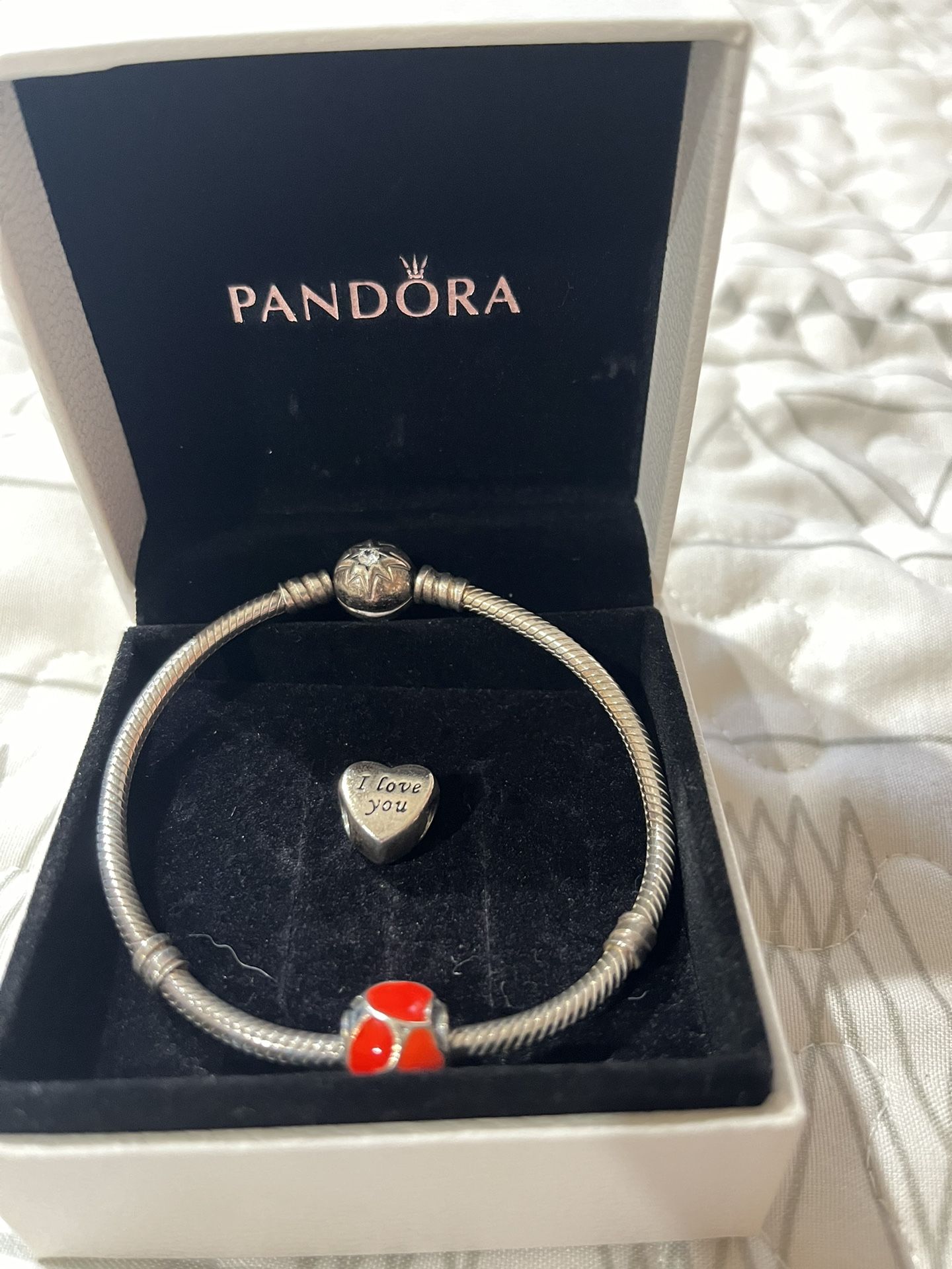 Pandora bracelet and 2 charms