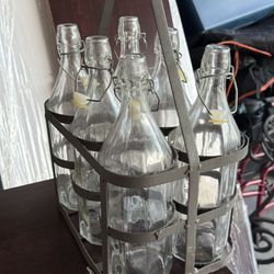 6 Vintage Glass Bottles With Lids In Metal Carrying Rack 