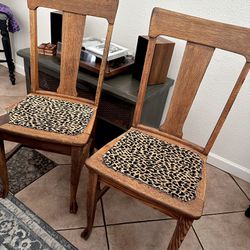 Two chic vintage leopard chairs