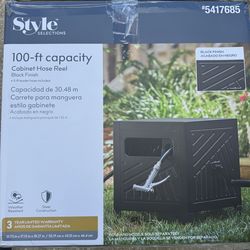 Metal black water hose reel.