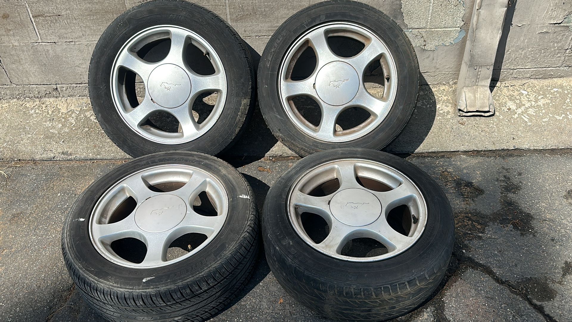 Ford Mustang 16 inch aluminum wheels and tires 5 on 4.5 inches