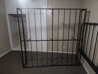 Black bed frame....issue with one leg