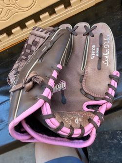 pink Rawlings WFP120 Fastpitch Softball Glove featuring a 12-inch leather palm.