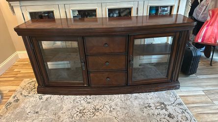 Solid wood Server.  Three drawers and shelves