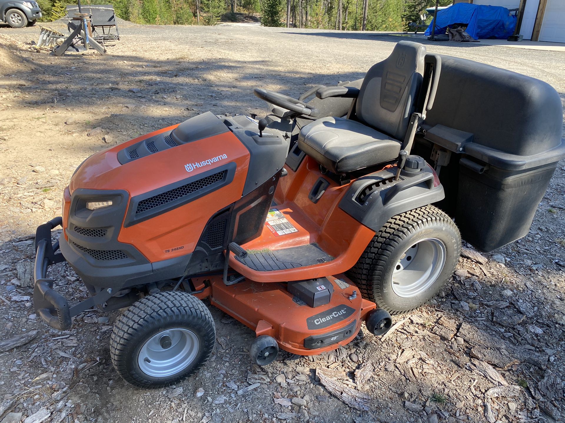 Husqvarna 48” riding lawn mower with triple bagger, diff lock, and lawn attachments
