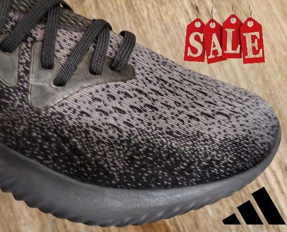 Adidas AlphaBOUNCE Beyond running shoes in a black and grey colorway