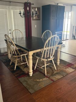 Very nice dining room table with 4 chairs