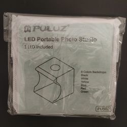 mini photography light box 2 LED Portable Photography Studio Mini Folding Photo Light Box Photography Tent Kit with 6 Color Background (20 x 20cm)

Im