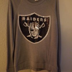 Pink Raiders Sweatshirt . Size M.  Pick up Only 