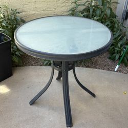 Heavy duty glass patio table. 