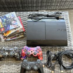 PS3 Super Slim Console 3 Controllers And Games
