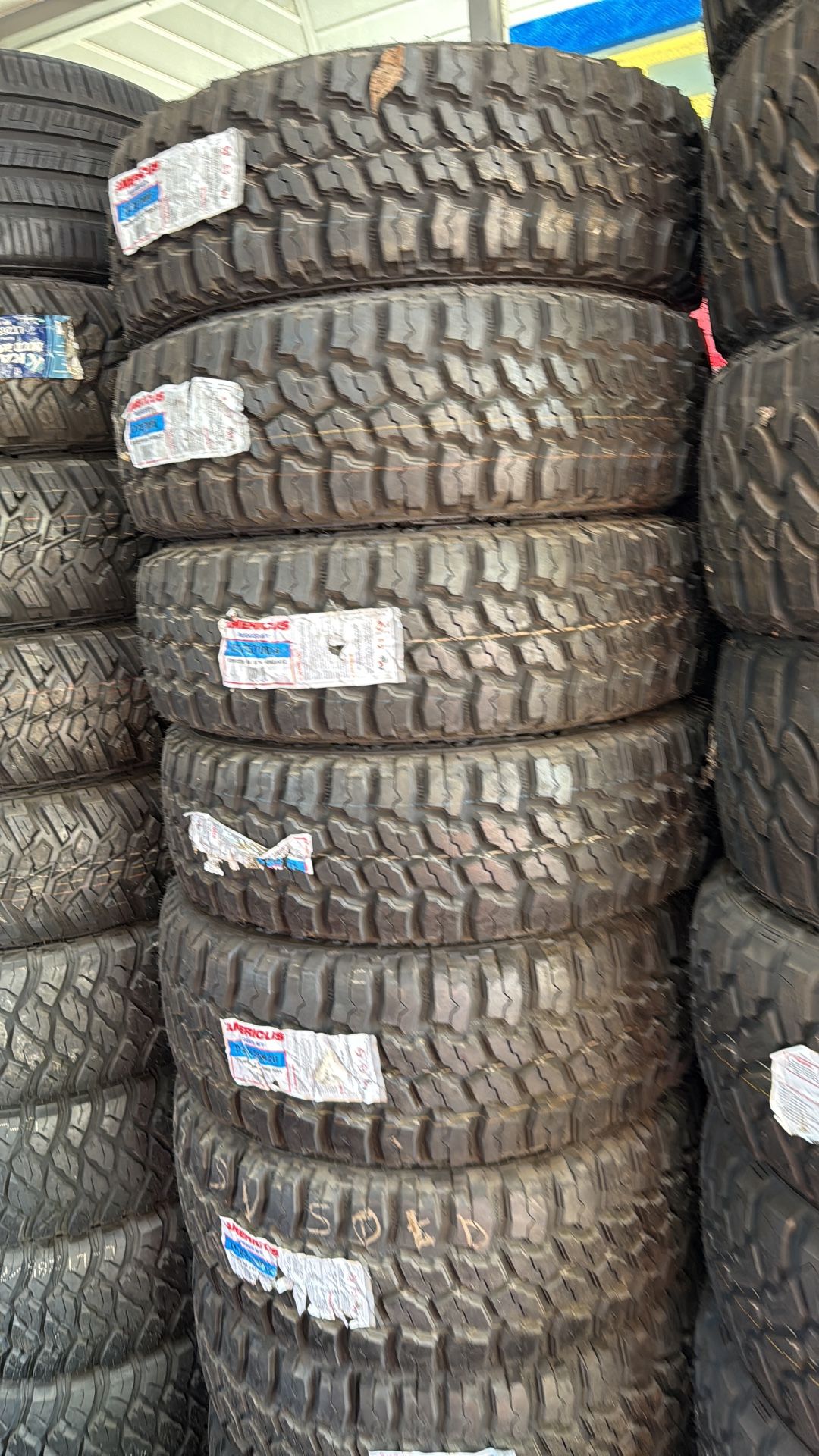 33X12.5020 SET OF 4 MUD TIRES WITH INSTALLATION AND BALANCING