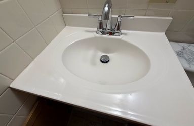 Glacier Bay - Bath Vanity with sink - w- 25in H- 36- D- 19 used - $65