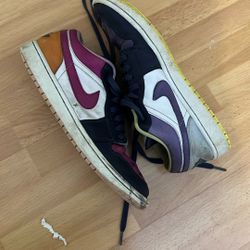 Nike Air Jordan 1 Low SE in the "Mismatched" Purple Magenta colorway