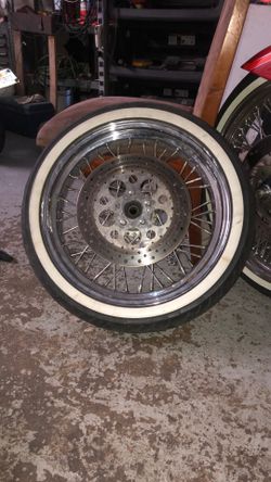 18” Harley motorcycle rim w/ tire and rotor