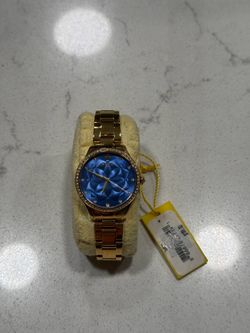 Invicta Angel Women’s Watch Rose Gold Blue Dial Model 24557 vs