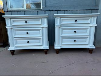 Two big solid wood night stand with three drawers in very good condition all drawers open just fine