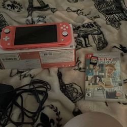 Nintendo Switch And Two Games 