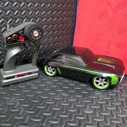 1:16 scale Traxxas Monster Energy West Coast Customs '69 Camaro radio-controlled car.