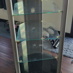 2 glass corner shelves in  good conditions