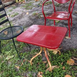 2metal Chairs And Table 