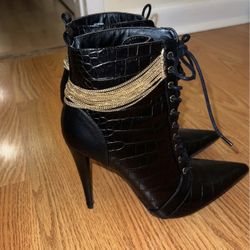Black leather croc embossed gold chain booties