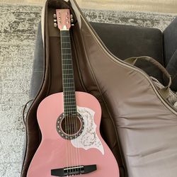 Pink guitar and case