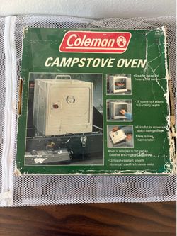 The Vintage Coleman Camp Stove Oven is a portable and foldable camping oven