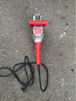 MILWAUKEE HOLE HAWG 1/2”  13MM DRILL USED.