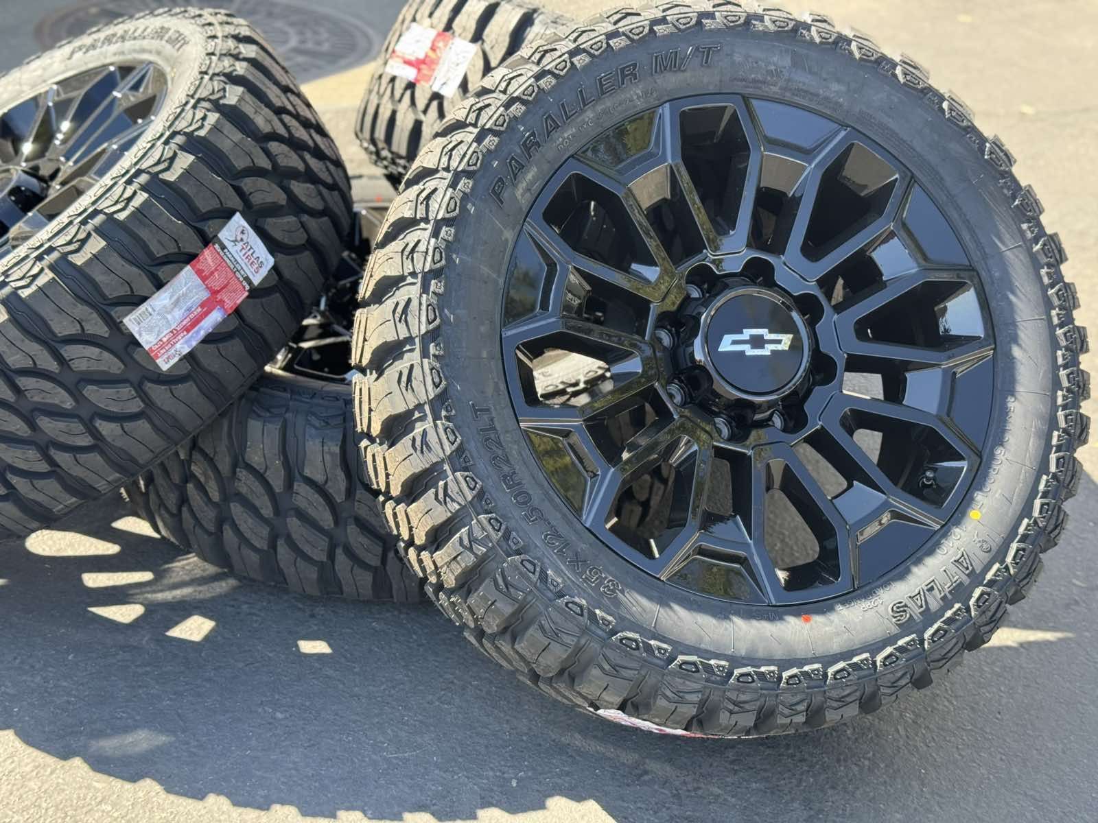 22" Black Wheels 22x9 8x180 Rims and 35” Tires 3500 Chevy 2500 Silverado Chevrolet GMC Sierra Denali HD 2500HD 3500HD AT4 Ultimate